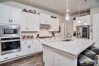Discover the epitome of elegant living in this exquisite corner on Kissing Tree Golf Club in Texas - for sale on GolfHomes.com, golf home, golf lot