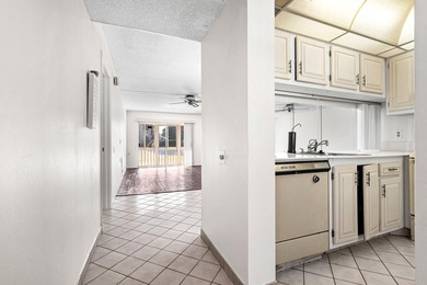 Welcome to resort-style living in this beautifully maintained on Wynmoor Golf Course in Florida - for sale on GolfHomes.com, golf home, golf lot