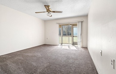 Welcome to resort-style living in this beautifully maintained on Wynmoor Golf Course in Florida - for sale on GolfHomes.com, golf home, golf lot