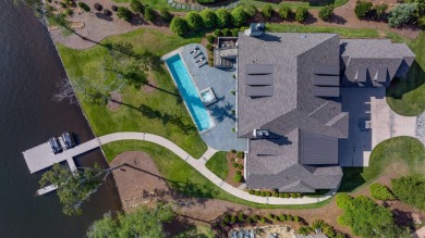 EXCEPTIONAL LAKEFRONT RESIDENCE WITH BREATHTAKING VIEWS FROM on The Golf Club at Cuscowilla in Georgia - for sale on GolfHomes.com, golf home, golf lot