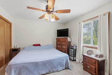 This spacious 3-bedroom, 2-bath ranch offers over 2,000 square on Canadian Lakes Country Club-The Royal Course in Michigan - for sale on GolfHomes.com, golf home, golf lot