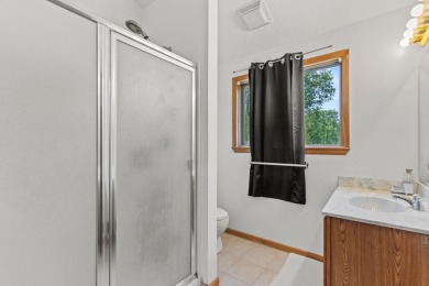 This spacious 3-bedroom, 2-bath ranch offers over 2,000 square on Canadian Lakes Country Club-The Royal Course in Michigan - for sale on GolfHomes.com, golf home, golf lot