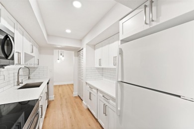 This stunning, completely remodeled 2-bedroom, 2-bathroom unit on Inverrary Country Club in Florida - for sale on GolfHomes.com, golf home, golf lot