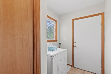 This spacious 3-bedroom, 2-bath ranch offers over 2,000 square on Canadian Lakes Country Club-The Royal Course in Michigan - for sale on GolfHomes.com, golf home, golf lot