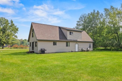 This spacious 3-bedroom, 2-bath ranch offers over 2,000 square on Canadian Lakes Country Club-The Royal Course in Michigan - for sale on GolfHomes.com, golf home, golf lot