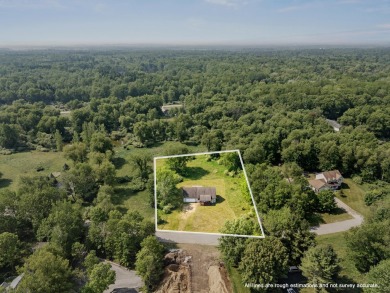 This spacious 3-bedroom, 2-bath ranch offers over 2,000 square on Canadian Lakes Country Club-The Royal Course in Michigan - for sale on GolfHomes.com, golf home, golf lot