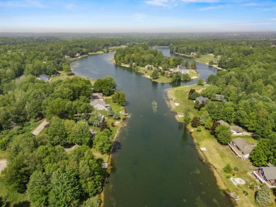This spacious 3-bedroom, 2-bath ranch offers over 2,000 square on Canadian Lakes Country Club-The Royal Course in Michigan - for sale on GolfHomes.com, golf home, golf lot