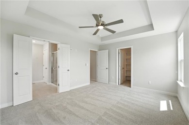 Welcome to this charming 4-bedroom, 3.5-bathroom two-story home on Golf Club of Creekmoor in Missouri - for sale on GolfHomes.com, golf home, golf lot