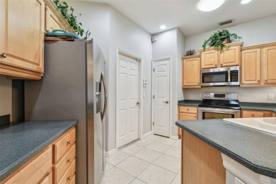 Beautifully maintained and updated home on a corner lot in a on Links At Greenfield Plantation in Florida - for sale on GolfHomes.com, golf home, golf lot