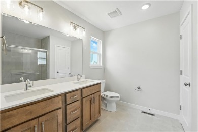 Welcome to this charming 4-bedroom, 3.5-bathroom two-story home on Golf Club of Creekmoor in Missouri - for sale on GolfHomes.com, golf home, golf lot