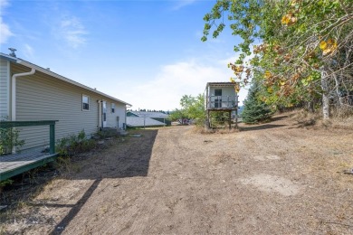 This spacious home, nestled near Deer Park Golf Course and the on Deer Park Golf Club in Montana - for sale on GolfHomes.com, golf home, golf lot