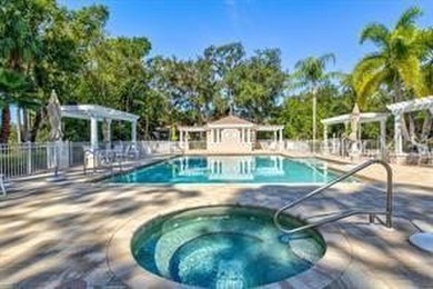 Welcome to this beautifully maintained and updated 3-bedroom, 2 on University Park Country Club in Florida - for sale on GolfHomes.com, golf home, golf lot