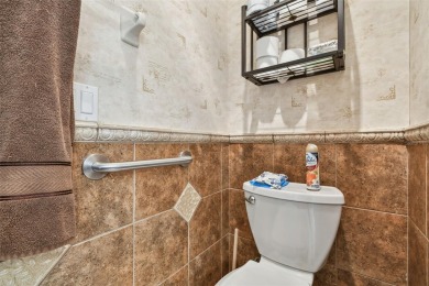 Beautifully maintained and updated home on a corner lot in a on Links At Greenfield Plantation in Florida - for sale on GolfHomes.com, golf home, golf lot