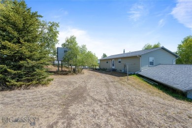 This spacious home, nestled near Deer Park Golf Course and the on Deer Park Golf Club in Montana - for sale on GolfHomes.com, golf home, golf lot