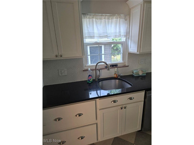 This charming ranch, nestled along a golf course just down the on Lake Forest Country Club in Ohio - for sale on GolfHomes.com, golf home, golf lot