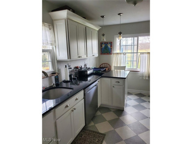 This charming ranch, nestled along a golf course just down the on Lake Forest Country Club in Ohio - for sale on GolfHomes.com, golf home, golf lot