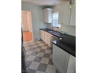 This charming ranch, nestled along a golf course just down the on Lake Forest Country Club in Ohio - for sale on GolfHomes.com, golf home, golf lot