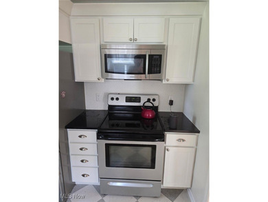 This charming ranch, nestled along a golf course just down the on Lake Forest Country Club in Ohio - for sale on GolfHomes.com, golf home, golf lot