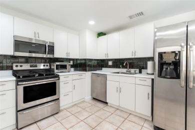 Welcome to this beautifully updated 3 bed, 2 bath condo villa on Grande Oaks Golf Club in Florida - for sale on GolfHomes.com, golf home, golf lot