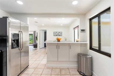 Welcome to this beautifully updated 3 bed, 2 bath condo villa on Grande Oaks Golf Club in Florida - for sale on GolfHomes.com, golf home, golf lot