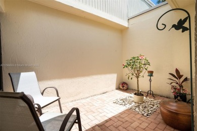 Welcome to this beautifully updated 3 bed, 2 bath condo villa on Grande Oaks Golf Club in Florida - for sale on GolfHomes.com, golf home, golf lot