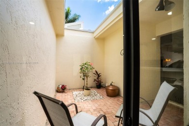 Welcome to this beautifully updated 3 bed, 2 bath condo villa on Grande Oaks Golf Club in Florida - for sale on GolfHomes.com, golf home, golf lot