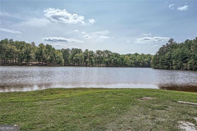 Welcome to 207 Eagles Flight, a beautiful home in the on Mirror Lake Golf Club in Georgia - for sale on GolfHomes.com, golf home, golf lot