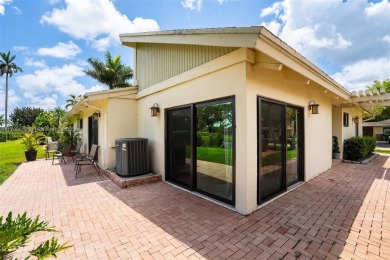 Welcome to this beautifully updated 3 bed, 2 bath condo villa on Grande Oaks Golf Club in Florida - for sale on GolfHomes.com, golf home, golf lot