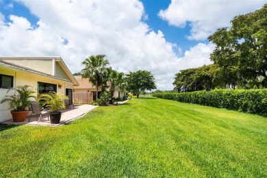 Welcome to this beautifully updated 3 bed, 2 bath condo villa on Grande Oaks Golf Club in Florida - for sale on GolfHomes.com, golf home, golf lot