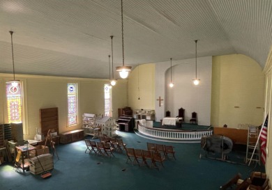 In 2018, the St. John's United Methodist Church was listed in on Waumbek Country Club in New Hampshire - for sale on GolfHomes.com, golf home, golf lot