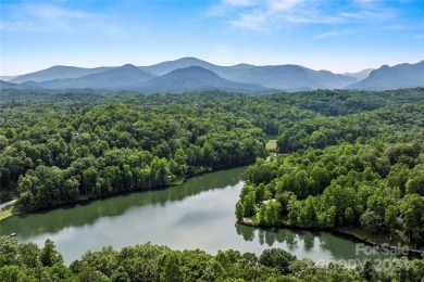 Welcome to your dream cabin nestled in the highly sought-after on Rumbling Bald Resort on Lake Lure in North Carolina - for sale on GolfHomes.com, golf home, golf lot