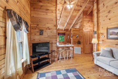 Welcome to your dream cabin nestled in the highly sought-after on Rumbling Bald Resort on Lake Lure in North Carolina - for sale on GolfHomes.com, golf home, golf lot