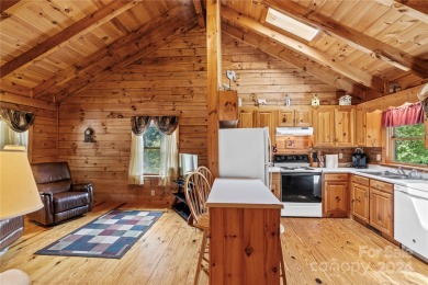 Welcome to your dream cabin nestled in the highly sought-after on Rumbling Bald Resort on Lake Lure in North Carolina - for sale on GolfHomes.com, golf home, golf lot