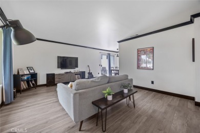 Enjoy your private patio and beautiful sunsets from this move-in on Azusa Greens Country Club in California - for sale on GolfHomes.com, golf home, golf lot
