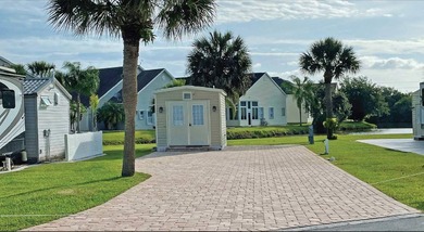 This 40'x80' brick paver RV site includes a 10'x14' shed with on The Great Outdoors Golf and Country Club in Florida - for sale on GolfHomes.com, golf home, golf lot