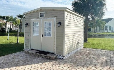 This 40'x80' brick paver RV site includes a 10'x14' shed with on The Great Outdoors Golf and Country Club in Florida - for sale on GolfHomes.com, golf home, golf lot