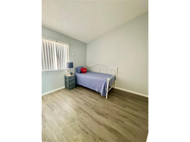 Townhouse Style Condo in Paseo Real Community in Kendall, this on Miccosukee Golf and Country Club in Florida - for sale on GolfHomes.com, golf home, golf lot