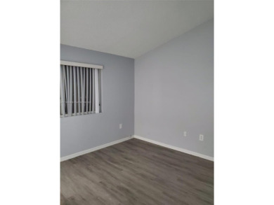 Townhouse Style Condo in Paseo Real Community in Kendall, this on Miccosukee Golf and Country Club in Florida - for sale on GolfHomes.com, golf home, golf lot