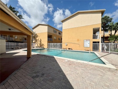 Townhouse Style Condo in Paseo Real Community in Kendall, this on Miccosukee Golf and Country Club in Florida - for sale on GolfHomes.com, golf home, golf lot
