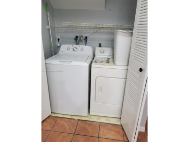 Townhouse Style Condo in Paseo Real Community in Kendall, this on Miccosukee Golf and Country Club in Florida - for sale on GolfHomes.com, golf home, golf lot