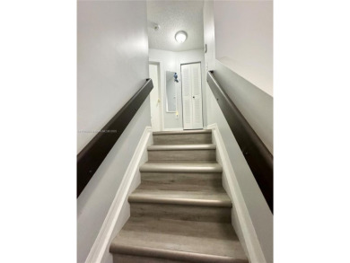 Townhouse Style Condo in Paseo Real Community in Kendall, this on Miccosukee Golf and Country Club in Florida - for sale on GolfHomes.com, golf home, golf lot