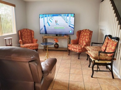 Townhouse Style Condo in Paseo Real Community in Kendall, this on Miccosukee Golf and Country Club in Florida - for sale on GolfHomes.com, golf home, golf lot