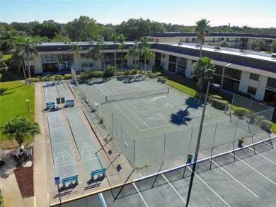 Welcome to this charming 2BR/2BA condo located in the Villas de on Largo Golf Course in Florida - for sale on GolfHomes.com, golf home, golf lot