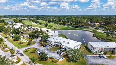 Rarely available 3-bedroom end unit featuring sweeping golf on Palm Aire Country Club of Sarasota in Florida - for sale on GolfHomes.com, golf home, golf lot