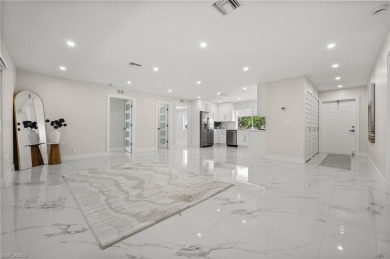This beautifully renovated residence offers a seamless blend of on The Glades Golf and Country Club in Florida - for sale on GolfHomes.com, golf home, golf lot