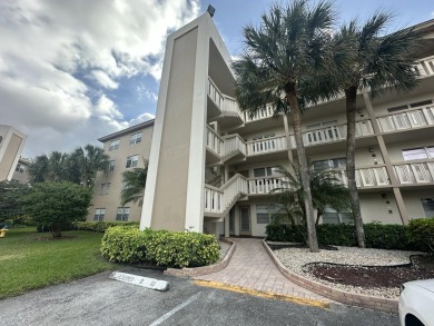 Fix & Flip Opportunity - Corner Unit in Martinique Court on Wynmoor Golf Course in Florida - for sale on GolfHomes.com, golf home, golf lot
