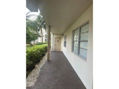 Fix & Flip Opportunity - Corner Unit in Martinique Court on Wynmoor Golf Course in Florida - for sale on GolfHomes.com, golf home, golf lot