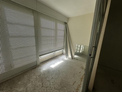 Fix & Flip Opportunity - Corner Unit in Martinique Court on Wynmoor Golf Course in Florida - for sale on GolfHomes.com, golf home, golf lot