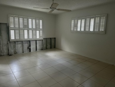 Fix & Flip Opportunity - Corner Unit in Martinique Court on Wynmoor Golf Course in Florida - for sale on GolfHomes.com, golf home, golf lot