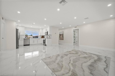 This beautifully renovated residence offers a seamless blend of on The Glades Golf and Country Club in Florida - for sale on GolfHomes.com, golf home, golf lot